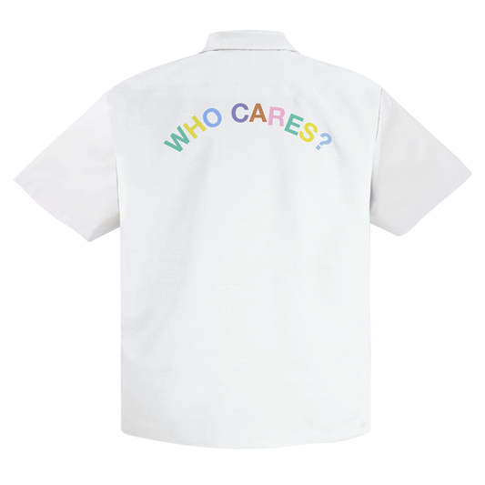 Back view of a white regular-fit poplin button-up shirt featuring a colourful screen-printed ‘WHO CARES?’ text across the back.