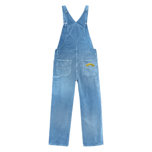 Back view of Dickies indigo overalls in stonewashed denim, featuring a yellow ‘WHO CARES?’ embroidery on the back right pocket.
