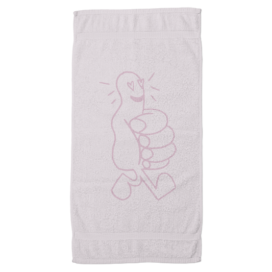Back view of the same pink jacquard beach towel showing the reverse of the thumbs-up heart eyes design.