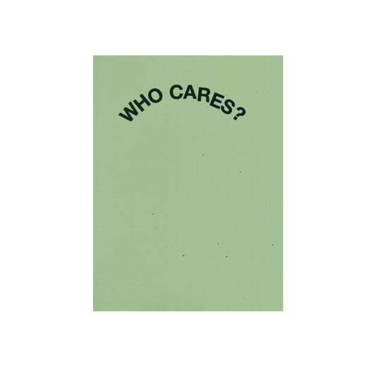Front view of the Rex Orange County: WHO CARES? green zine, featuring a green cover with black text reading ‘WHO CARES?’.